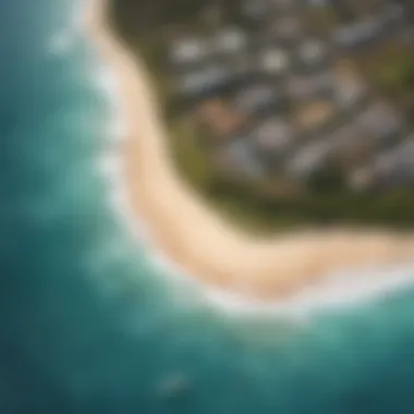 Aerial Perspective of Oahu's Surfing Paradise An aerial view of a popular surfing spot in Oahu, highlighting the waves and surfers
