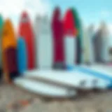 Diverse Beginner Surfboards A collection of various beginner surfboards displayed on a beach.