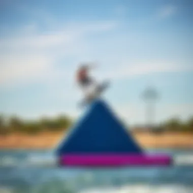 Wakeboarders utilizing a collapsible tower for tricks