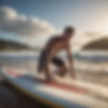 Essential Surfboard Maintenance Tips A beginner surfer maintaining their surfboard