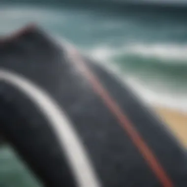 Close-up of a wetsuit hanging on a surfboard