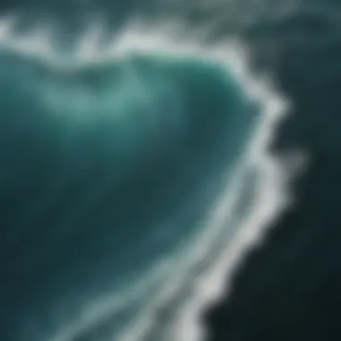 An aerial view of the ocean displaying swirling currents and distinct color gradients.