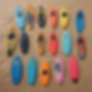 A variety of bodyboards laid out on the sand, highlighting different shapes and sizes