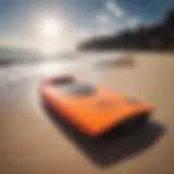 A sleek bodyboard on the beach showcasing its design.