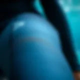 Wetsuit Material: Flexibility and Texture Close-up view of wetsuit material showcasing flexibility and texture for maximum comfort