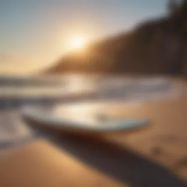 A serene image of a hydrofoil surfboard resting on a tranquil beach at sunset