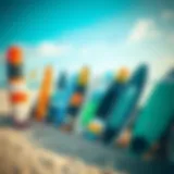 Variety of kitesurf boards on a sandy beach