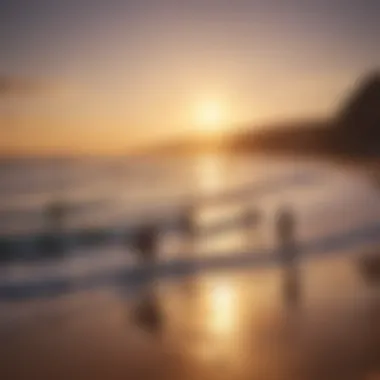 Sunset view of surfers preparing for an evening session on the beach.