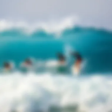 Group of surfers catching waves