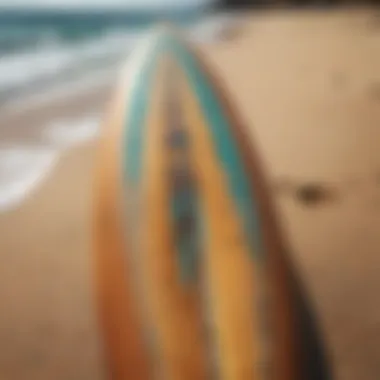 A close-up of a surfboard featuring unique designs, symbolizing personal style.