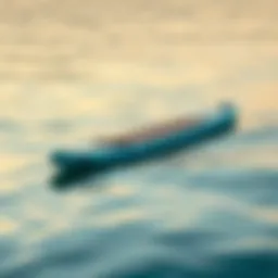 A sleek touring inflatable stand-up paddleboard gliding over calm waters