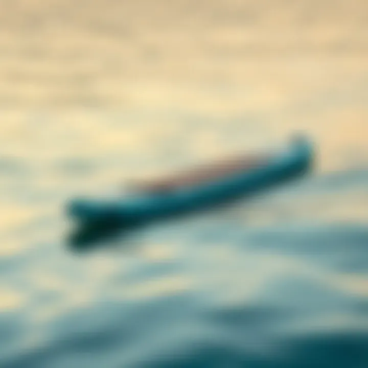 A sleek touring inflatable stand-up paddleboard gliding over calm waters