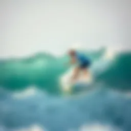 Surfer riding a wave at Doheny Beach