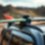 Detailed view of surfboard roof rack attachment on a vehicle