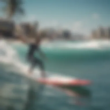 A surf instructor teaching a beginner on the water