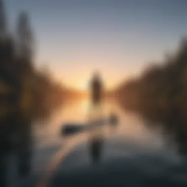 Paddleboarding on a serene lake at sunset