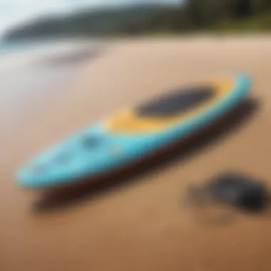 Rigid paddle board on a sandy beach