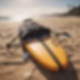 Pro Lite Board Bag displayed on a sandy beach with surfboards