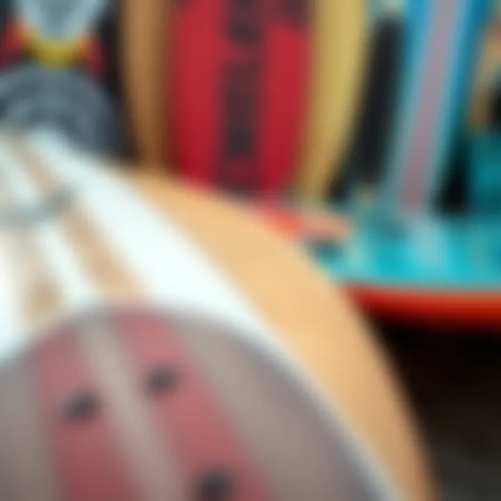 A close-up of various skimboards showcasing different materials and designs