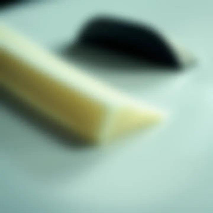 Understanding Surfboard Materials Close-up of surfboard materials highlighting foam and fiberglass.