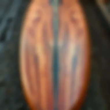 The Art of Teak Craftsmanship in Surfboard Tuning Decks A beautifully crafted teak tuning deck showcasing its natural grains and textures.