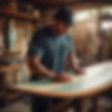 An artisan shaping a surfboard with precision tools