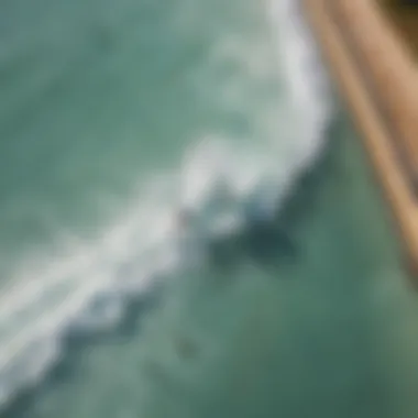 Aerial view of a wave pool showcasing surfers in action