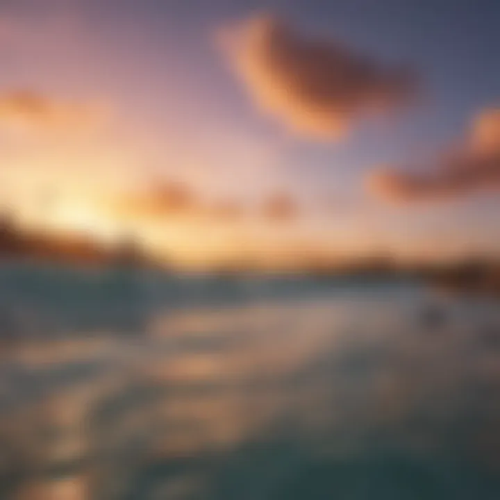 A vibrant sunset over the wave pool with surfers silhouetted