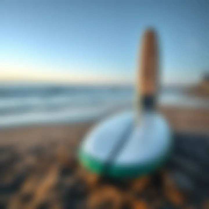 Tide Table Displayed with Surfboard on the Shore Tide table and surfboard on the beach