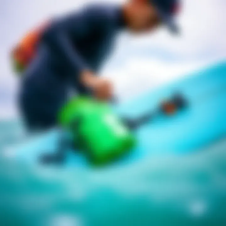 Surfer securing waterproof pouch to surfboard